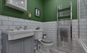 westview cottage white and green bathroom
