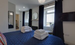 westview cottage master bedroom complete with towels